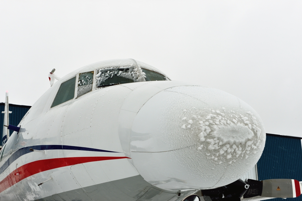 Ice buildup on the NRC Convair 580 can be seen on the aircraft nose and windows.
