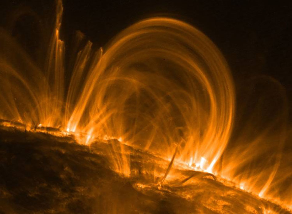 Coronal loops observed by NASA’s Transition Region And Coronal Explorer (TRACE) spacecraft. Credit: NASA/TRACE