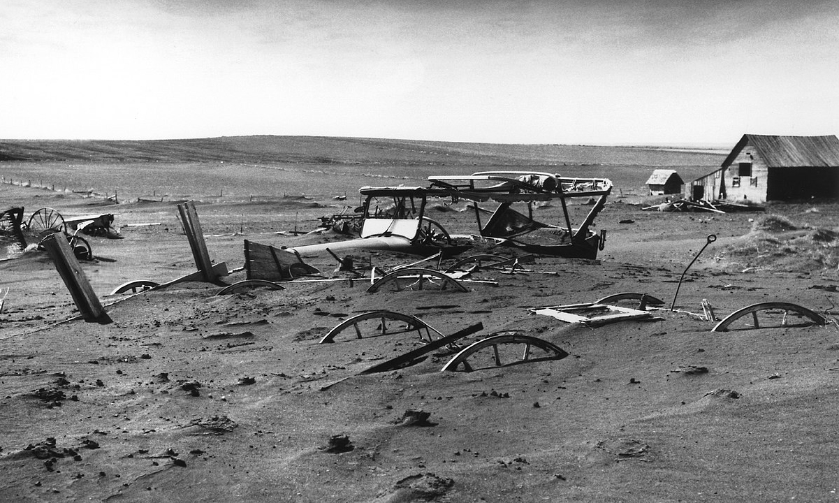  Buried machinery in barn lot in South Dakota during the Dust Bowl.