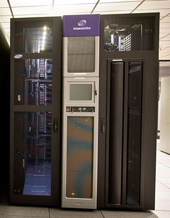 Photograph of a large, black and steel mass storage computing library