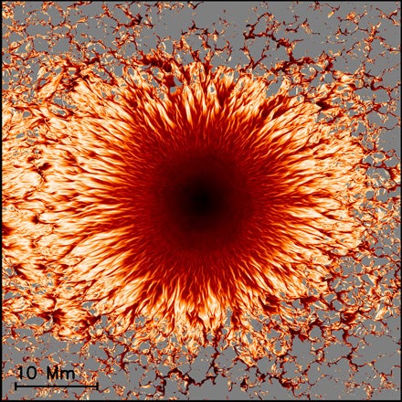 Visualization in shades of red, black and gray of a sunspot