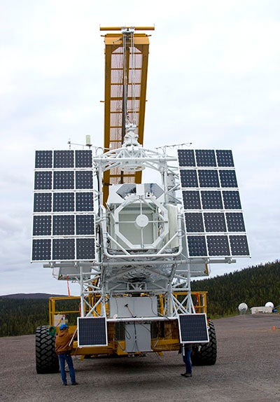 Scientific equipment, including solar panels, on a truck