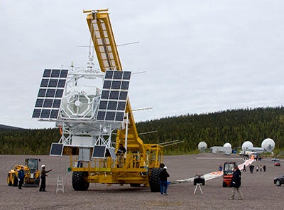 Truck with crane carrying scientific eauipment