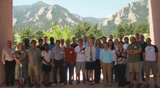 Photo of a group of people in front of Flatirons