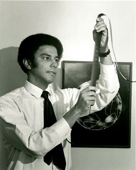 Photo of man looking at film
