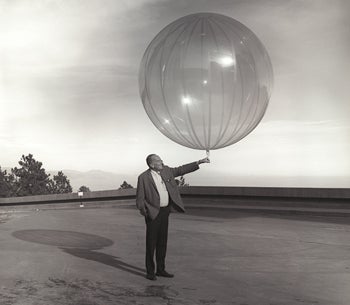 Man holding a large balloon