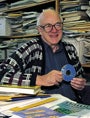 photo of a man sitting at desk