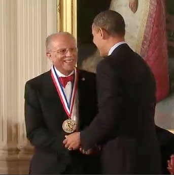 Warren Washington receiving medal from Pres. Obama
