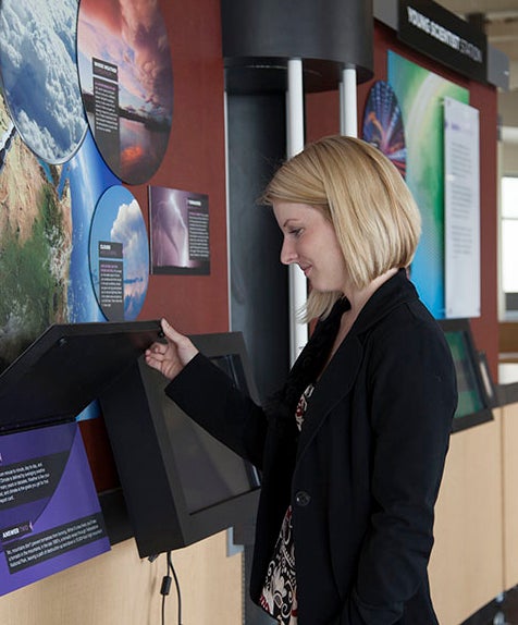 Cassie Cowsert looks over the Young Scientist Station