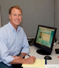 Bill Gail at his desk