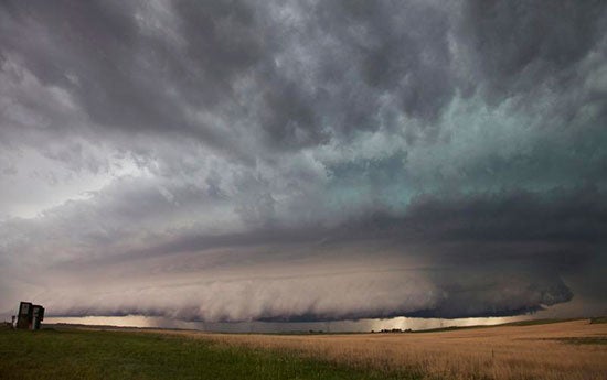 A large wall cloud arcs around a rotating thunderstorm updraft on June 6, 2010, near Ogalalla, Nebraska