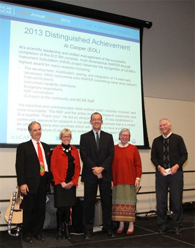 William "Al" Cooper (far right) accepts Distinguished Achievement Award