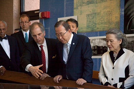Ban Ki-Moon and guests examine the Mesa Lab model