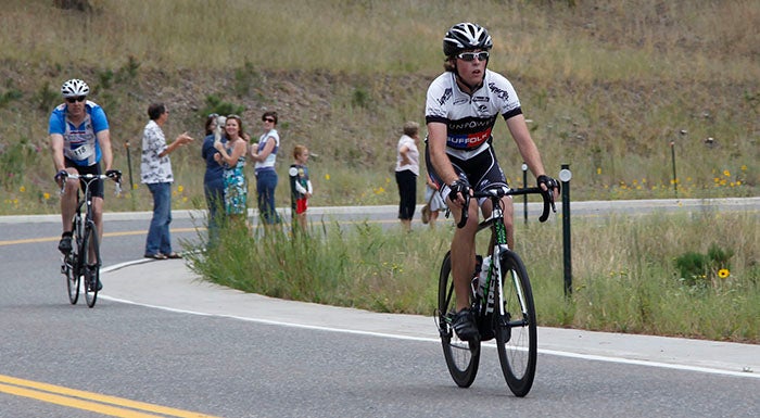 Laura Landrum wins the women's bike race at Up-the-Hill Race