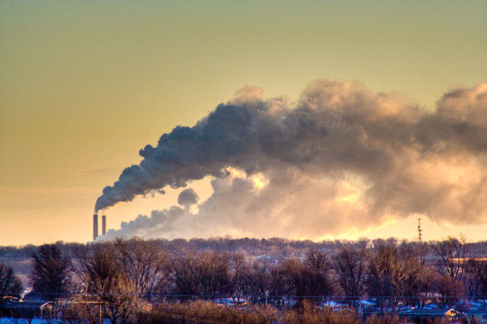 Smokestack emissions in early-morning light