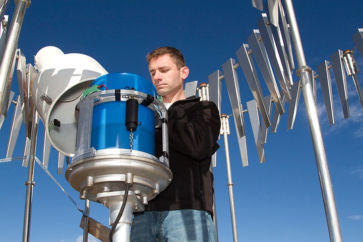 Scott Landolt checks snow gauge at NCAR's Marshall Field Site