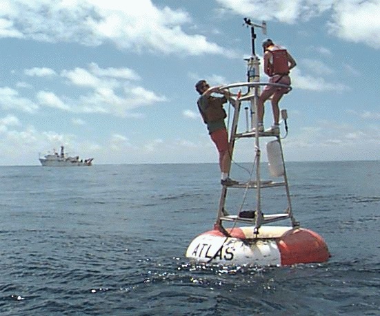 Technicians with TAO buoy