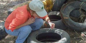 Image of scientist testing water