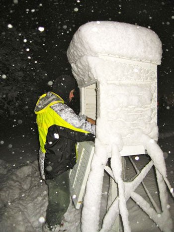 Measuring snow: Matt Kelsch, hydrometeorologist, at the Boulder, CO weather observing station