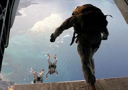 Burge skydiving while a Marine