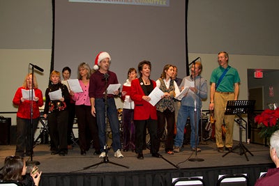 The UCARolers singing on stage.