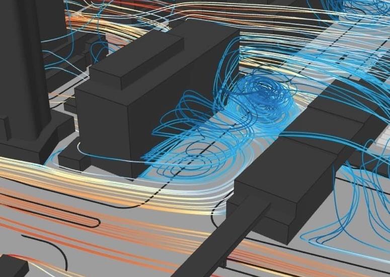 Rendering of wind moving through an urban setting. Wind shown as lines moving around buildings with circular eddies.