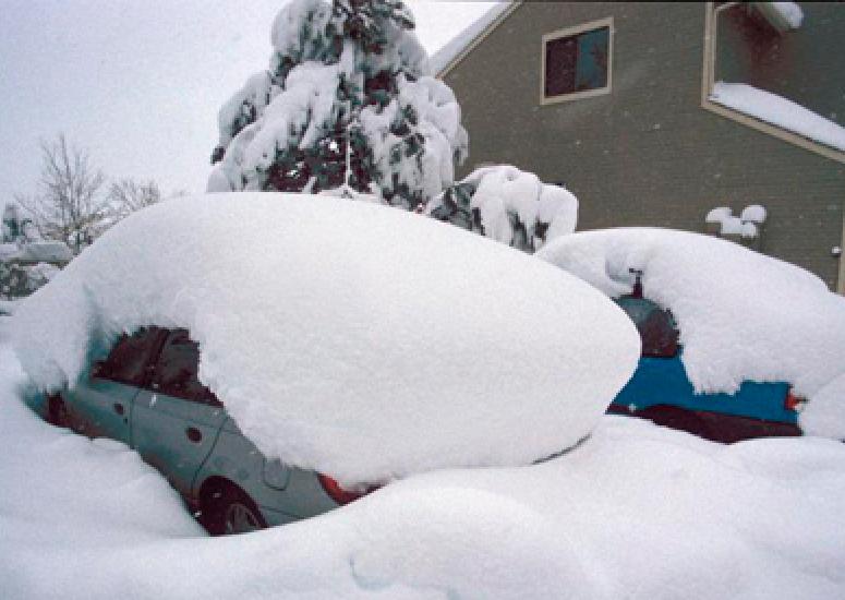 Cars buried in snow during March 2003 storm in Boulder County, CO