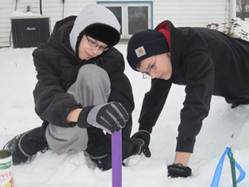 Luke and Ben Hartman measure snow for SNOwD UNDER