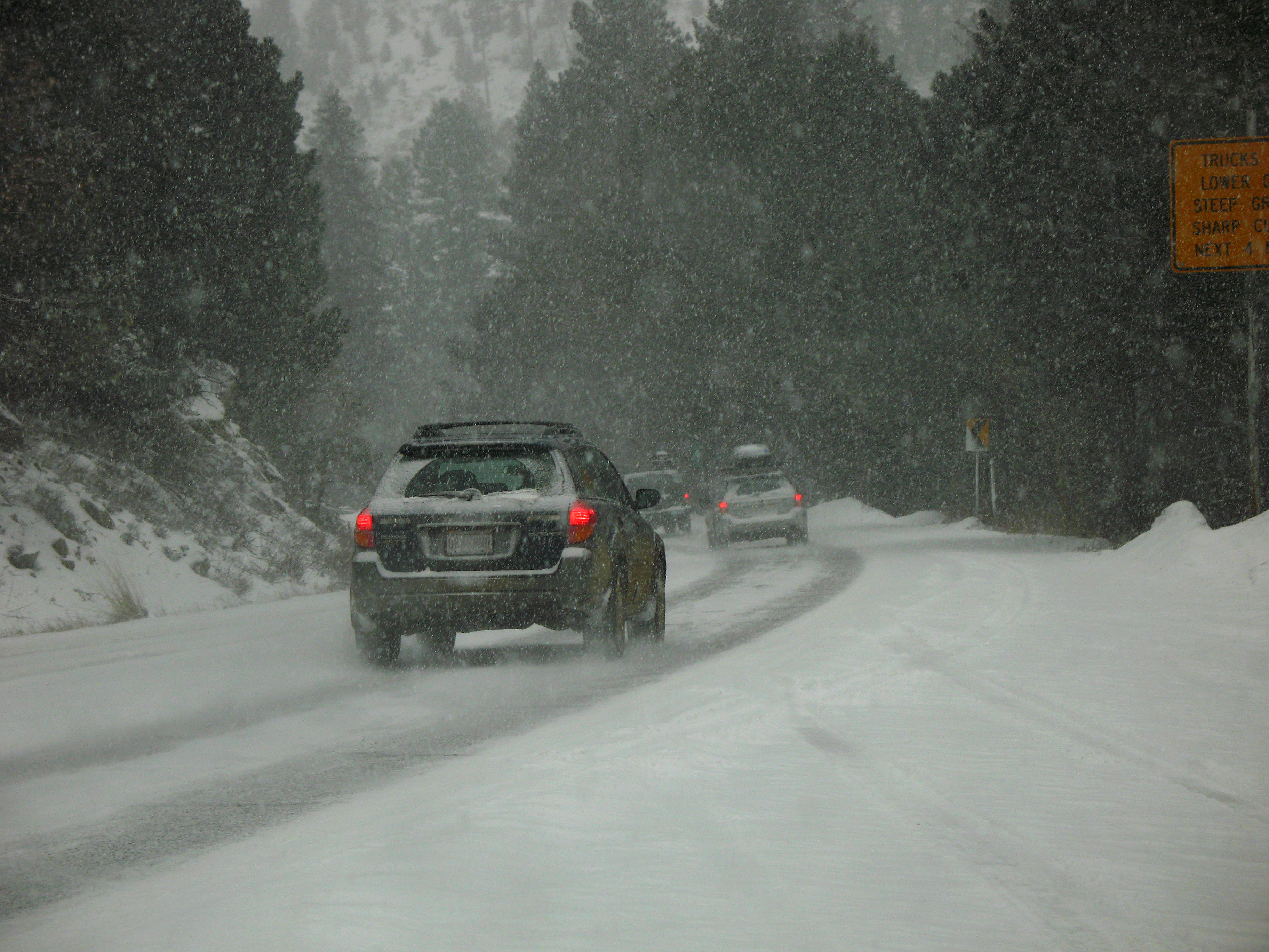 Cars driving in snowy conditions