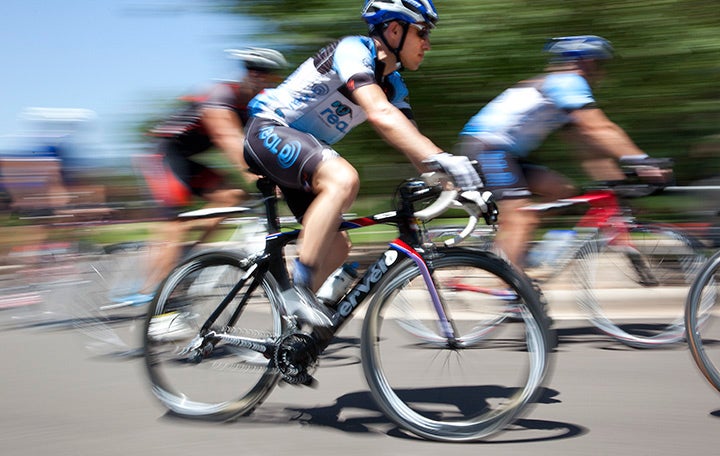 Cyclists zip around Mitchell Lane curve on Tuesday lunchtime ride