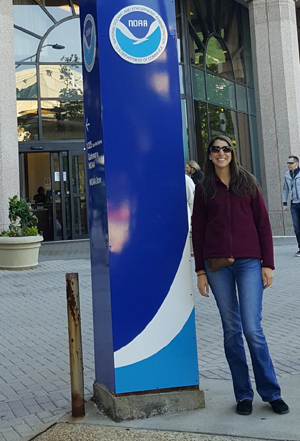 Christina Speciale in front of National Weather Service headquarters.