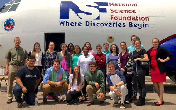 ULW students in front of the NSF/NCAR C-130 research aircraft.